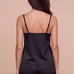 Women's dark satin camisole and lace-trim shorts set, open back with straps.