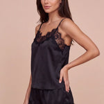 Women's dark satin camisole and lace-trim shorts set with V-neck lace trim.