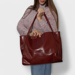 Blair tote bag in dark red with two handles and structured body