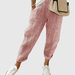 Nina pinstriped trousers in red and white with ankle cuffs
