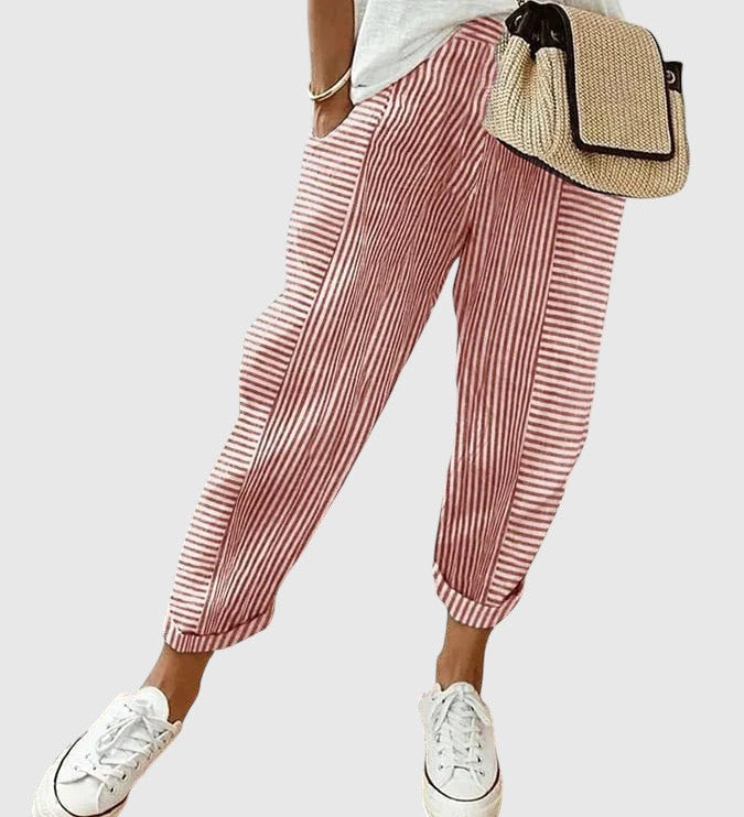 Nina pinstriped trousers in red and white with ankle cuffs