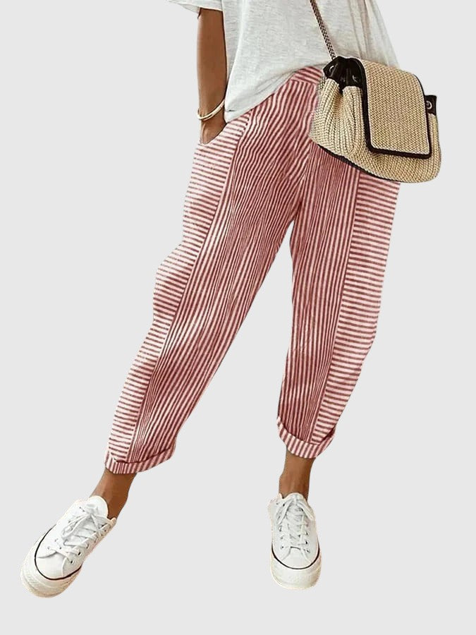 Nina pinstriped trousers in red and white with ankle cuffs