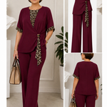 Maroon two-piece pantsuit with V-neck top and leopard-print tie detail