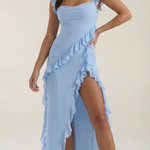 Light blue elegant dress with thin straps, ruffled accents, and asymmetrical hem