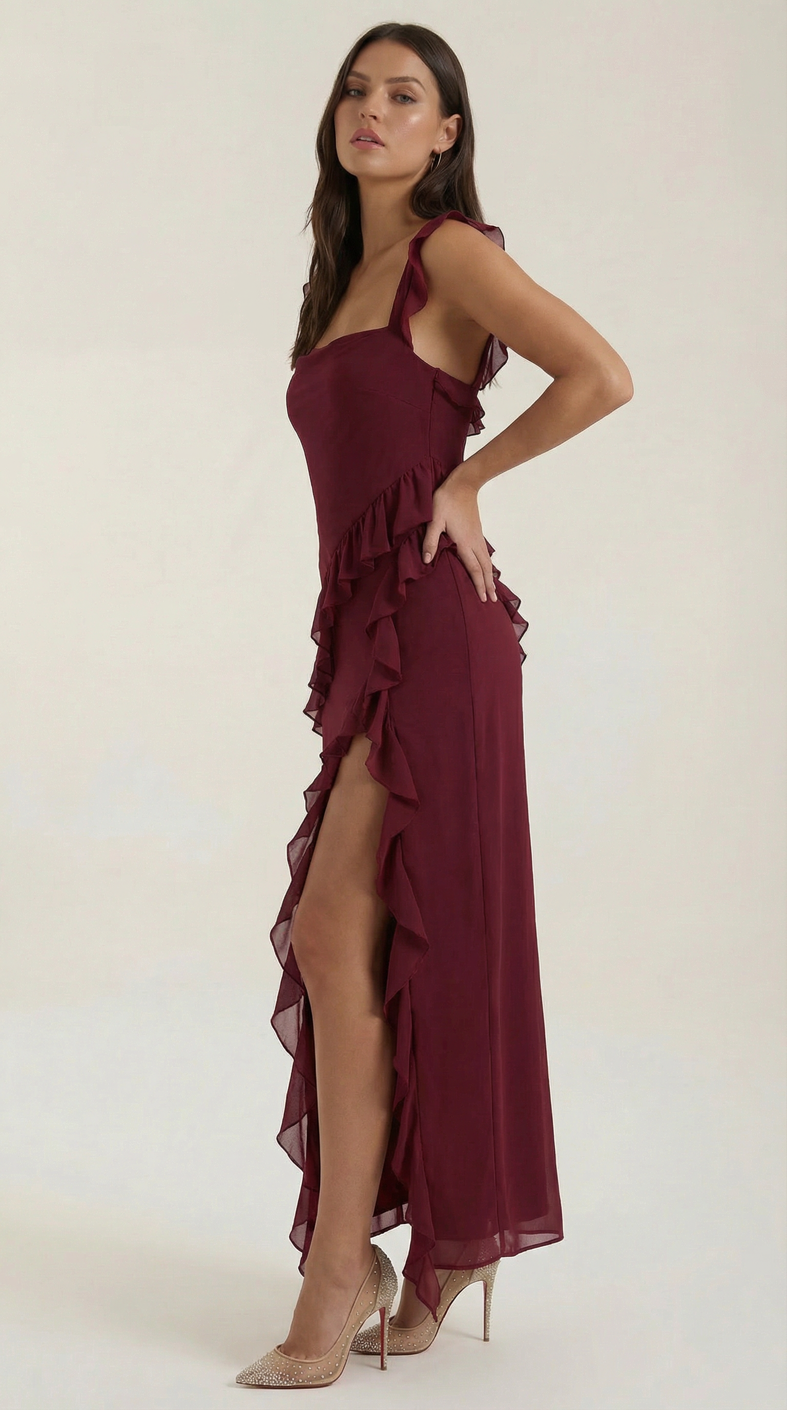 Burgundy ruffled sleeveless maxi dress with thigh-high slit and layered skirt