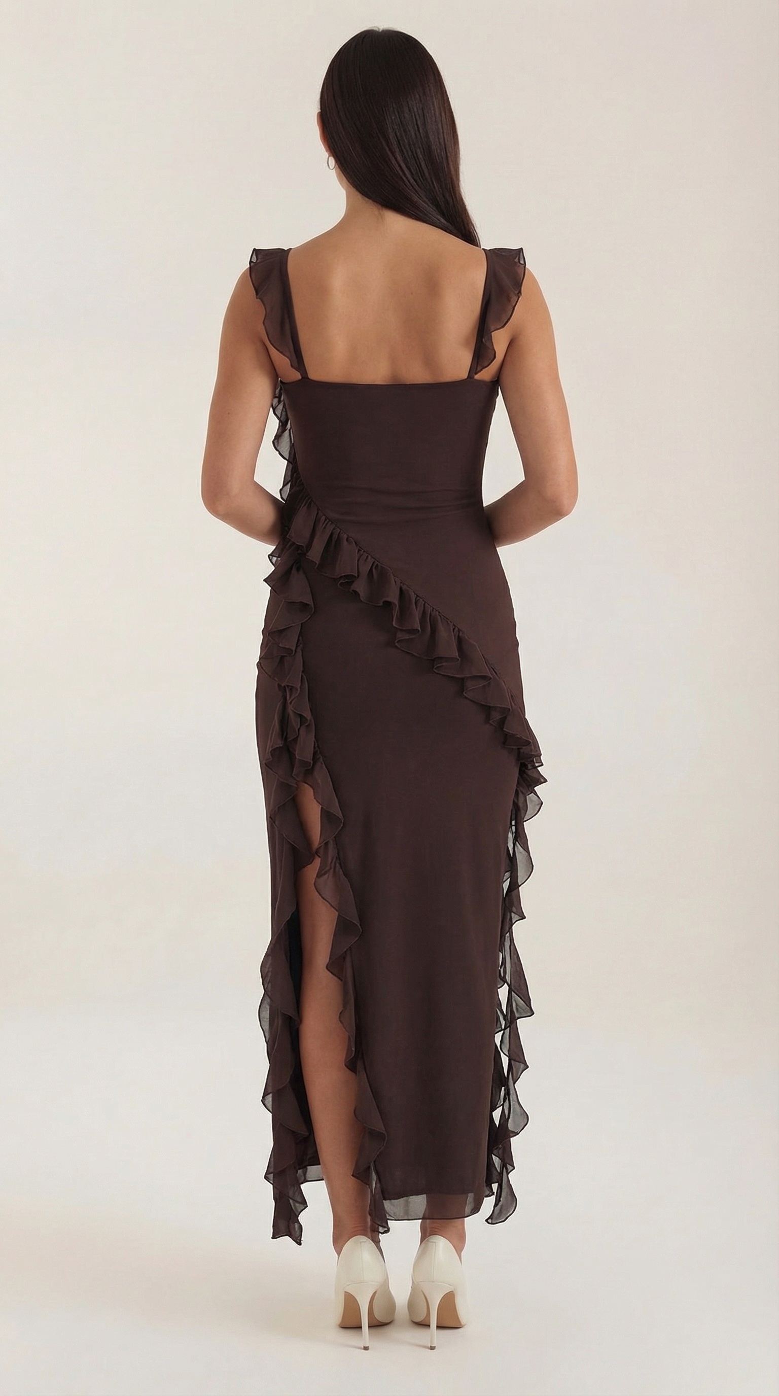 Brown elegant dress from back with thin straps and layered ruffle skirt