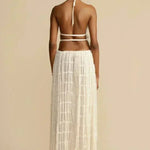 White pleated backless halter crop top with tie-back strap, back view