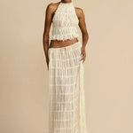 White pleated halter crop top with ruffled tiers, front view