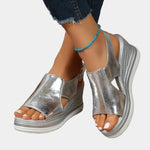 Orthopedic silver platform sandals with open toe and beaded ankle strap