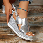 Orthopedic silver sandals with ankle buckle strap, open toe, and cushioned platform