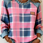 Women’s flannel pullover with pink-and-blue plaid, denim collar and cuffs, chest patch