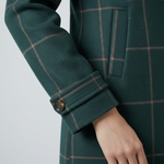 Women's plaid coat sleeve with buttoned cuff and rolled hem