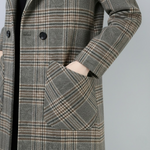 Plaid coat chest pocket and dark button detail with long sleeve cuff