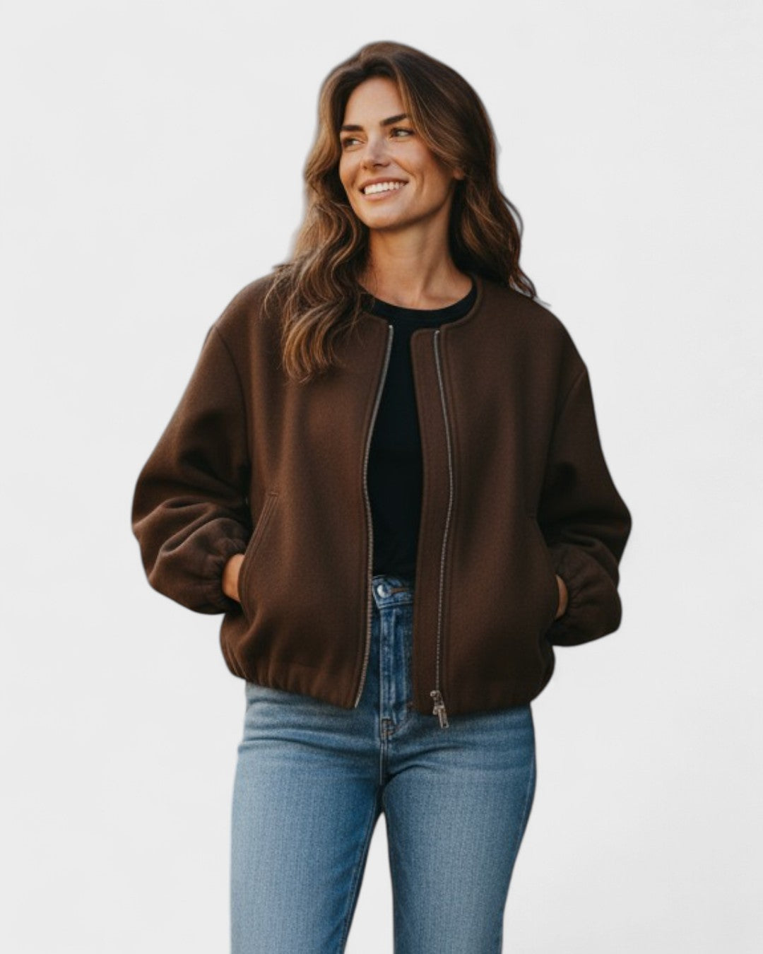 Brown cropped bomber jacket with front zipper, elastic cuffs, and side pockets