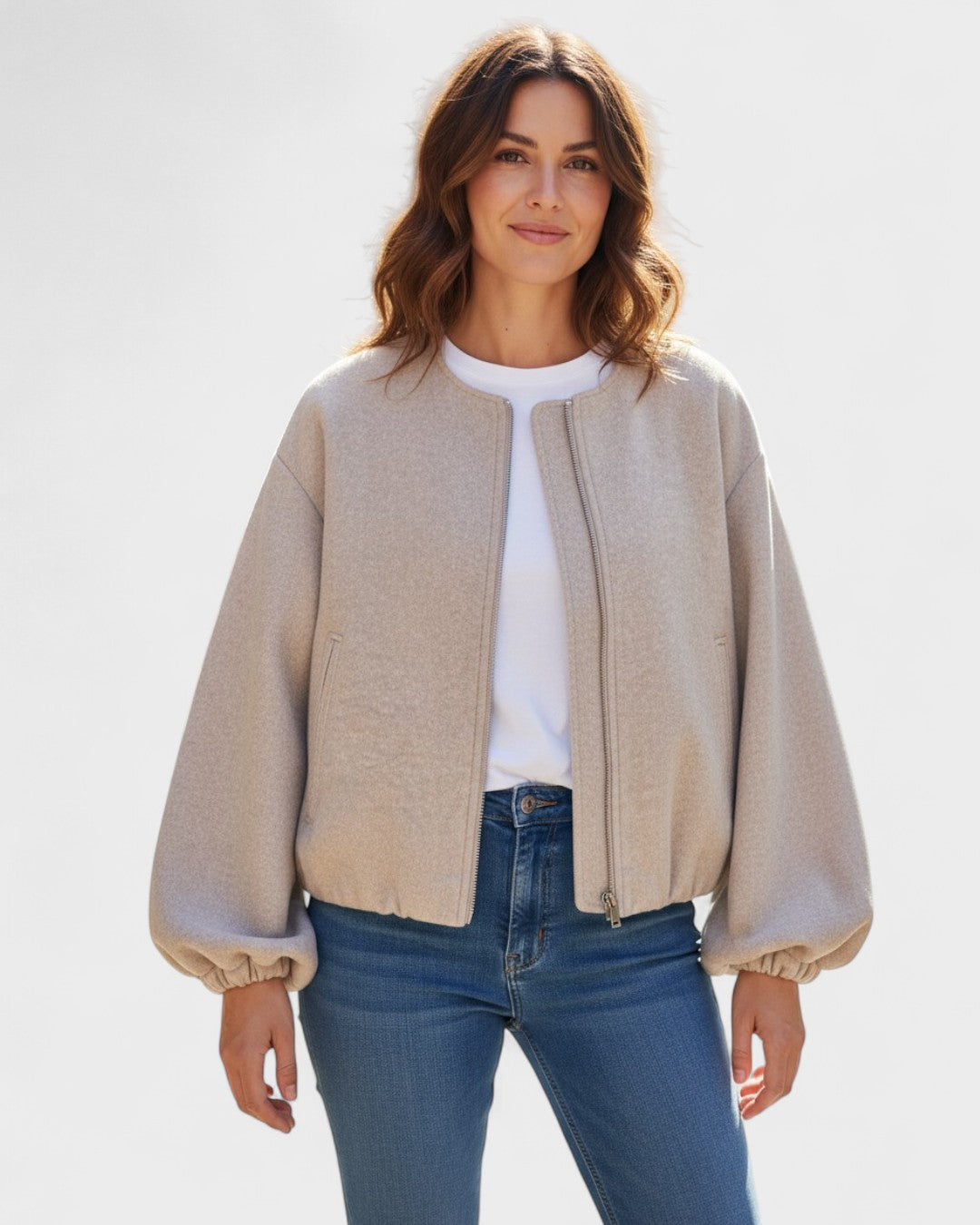 Light beige cropped zip-front bomber jacket with ribbed cuffs and side pockets