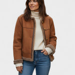 Brown shearling-lined coat with button front, sherpa-trim collar and hem