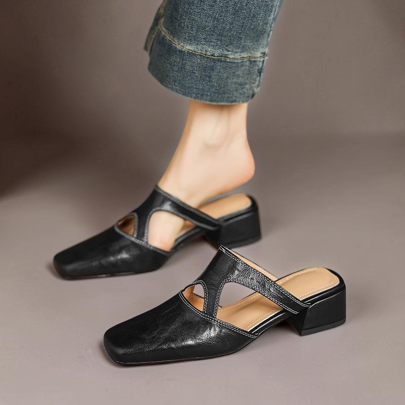 Natural leather mule flats in black, low block heel with ankle cutout and strap