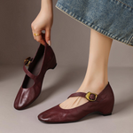 Burgundy round-toe Mary Jane pumps with buckled strap and low block heel