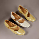 Mary Jane heels set in yellow and white leather with gold-tone buckles