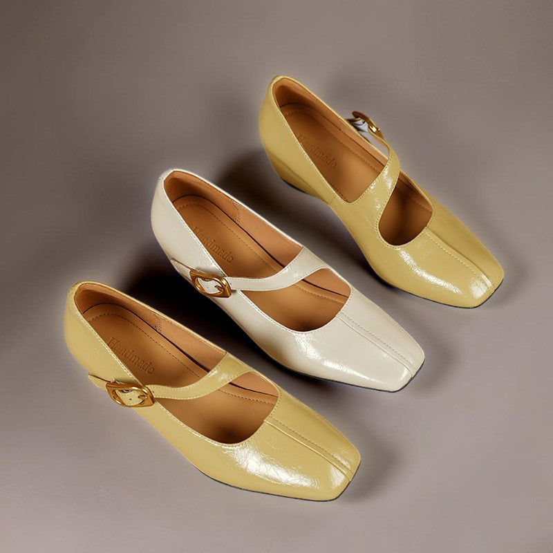 Mary Jane heels set in yellow and white leather with gold-tone buckles