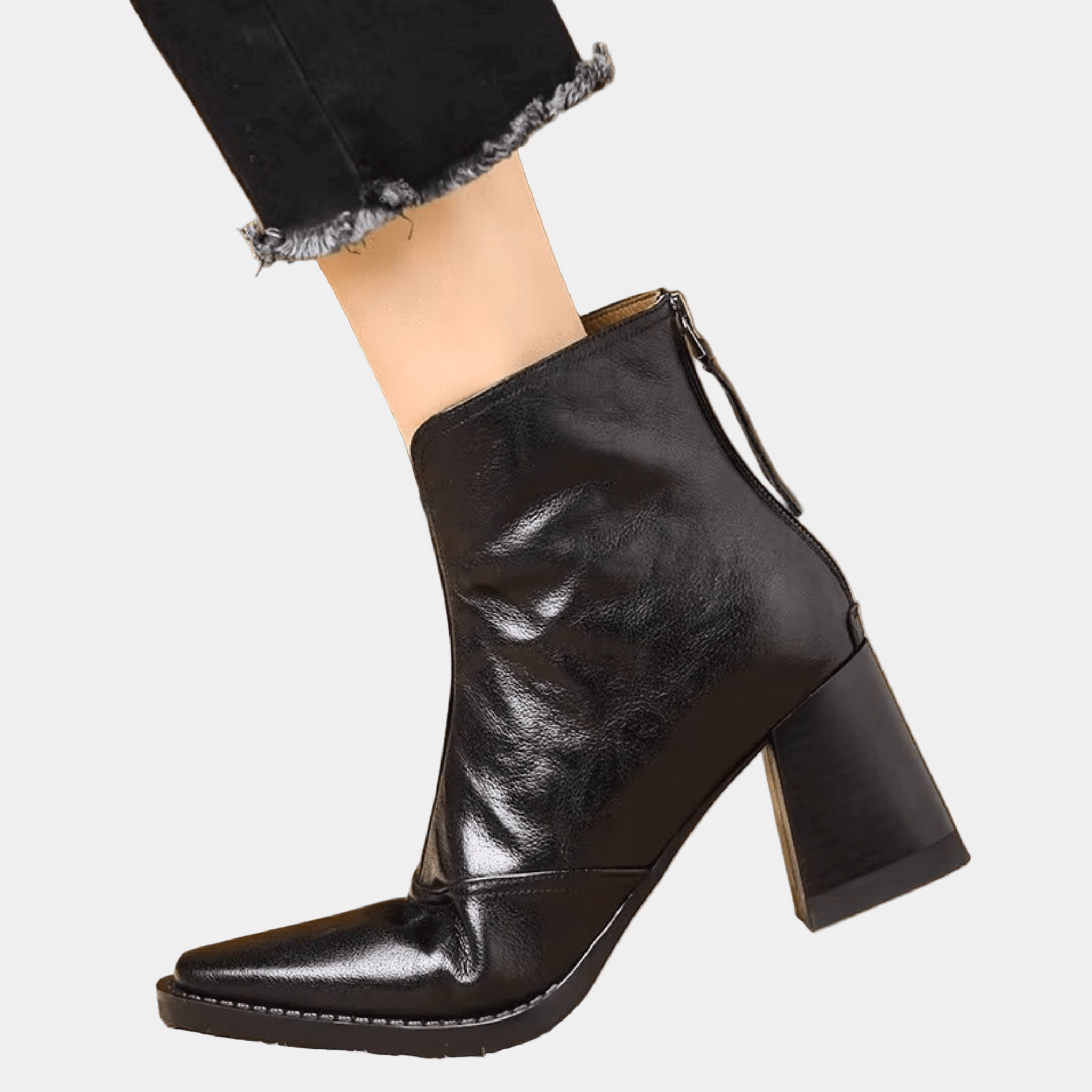 Black ankle boot with medium block heel and side strap detail, leather-look finish