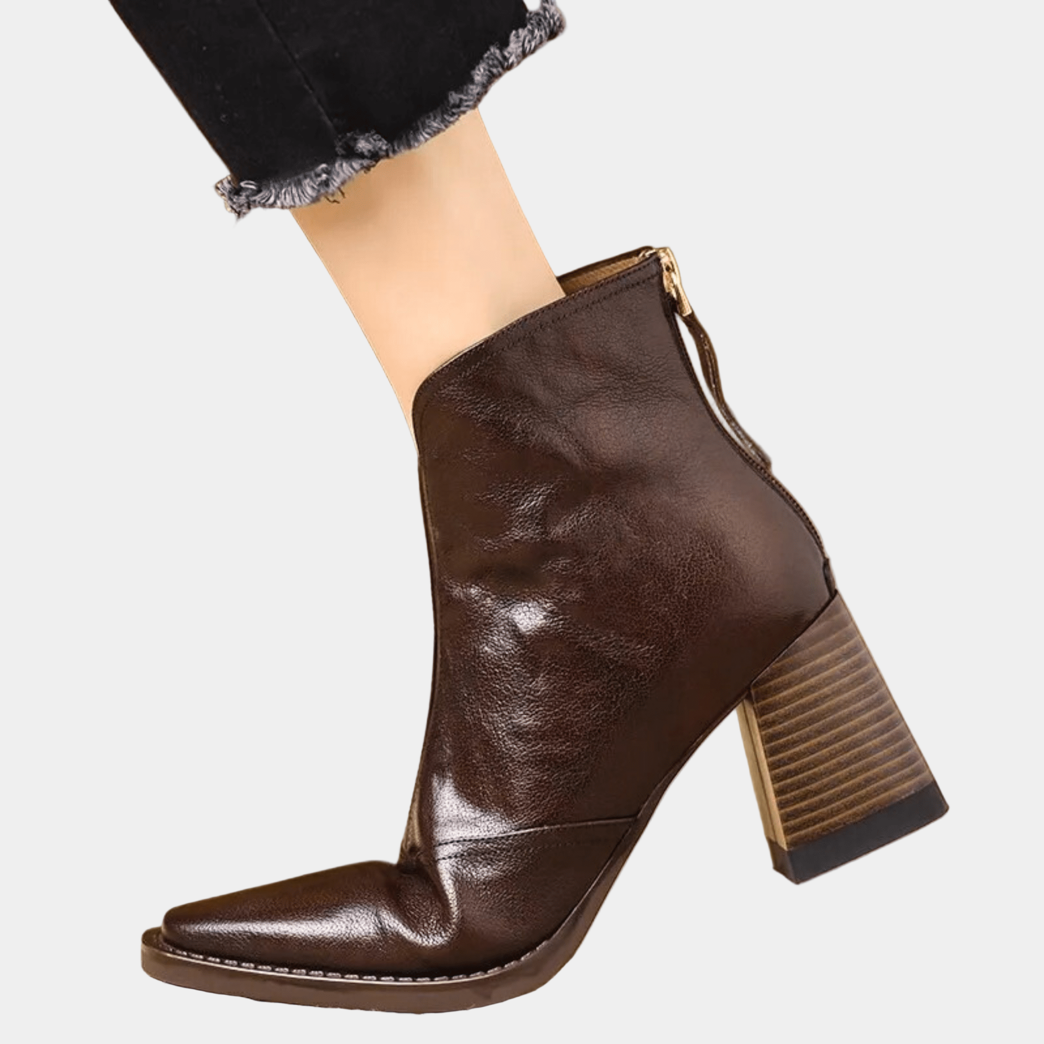 Brown ankle boot with medium block heel and side zip closure, textured leather-look