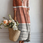Rust-brown comfort dress with striped panel and V-neck, 3/4 sleeves, knee length