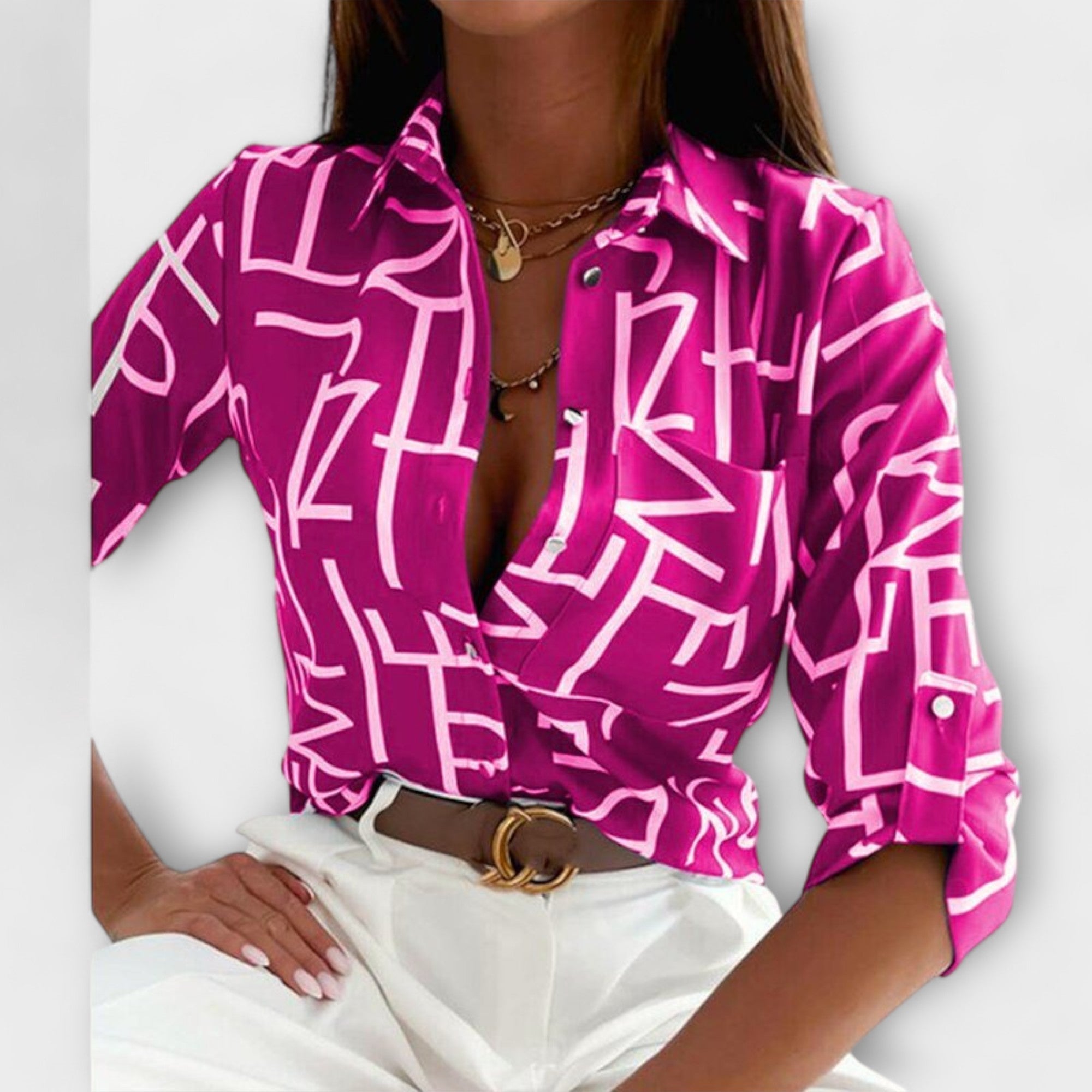 Classic collar button-front blouse with magenta abstract print and long sleeves