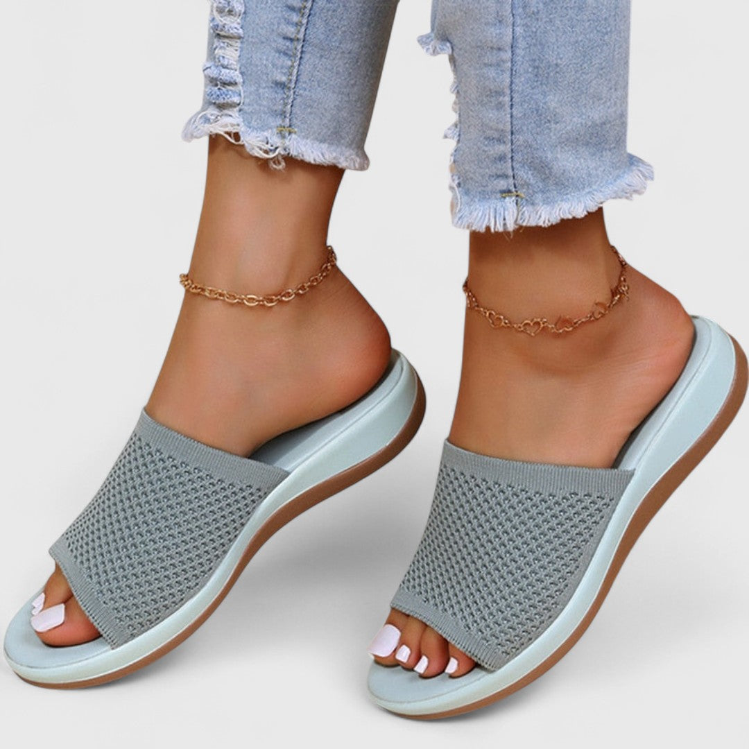 Women’s breathable orthopedic light blue-gray slide sandals with open toe and knit upper